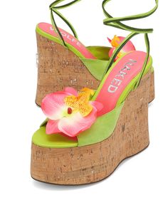 Product Description Sunflower our brand new wedged heel with a peep toe design perfect to complete a summer look. This style has a super cute soft green suede upper design with a striking pink flower, Summery ankle tie with a beaded finish to match and a Glitter cork wrap featuring the famous wolfe head plaque on the heel. Features 140mm heel height 60mm platform height 100% suede upper Suede soft leg tie Beaded tie finish Flower centre piece Leather lining Cork wedge cover Full leather insole f Platform Summer Shoes, Vintage Wedge Heels, Pink And Green Shoes, Wedged Heel, Beaded Tie, Soft Legs, Naked Wolfe, Pink Wedges, Wedges Heels