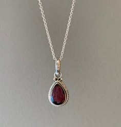 Sterling silver teardrop Garnet necklace. Ideal gift for her.Matching earrings available. Sterling Silver Teardrop Necklace For Her, Teardrop Sterling Silver Necklace As Gift For Her, Silver Pear-shaped Necklace For Gift, Pear-shaped Silver Necklace For Gift, Silver Pear-shaped Necklace Gift, Silver Birthstone Drop Necklace, Silver Drop Necklace With Birthstone, Silver Teardrop Birthstone Drop Necklace, Silver Drop Necklace With Gemstone For Gift