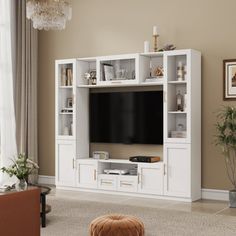 a living room with a large entertainment center