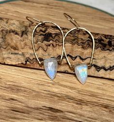 ❤️ Stunning Rainbow Moonstone and Gold Open Hoop Earring❤️ ~ June Birthday / Birthstone  ~ ALL 14K Gold-Filled, Handformed by me out of Sturdy Wire ~ ~ Size: Dangles about 2.75 inches and they are about one inch across ~ ~ Gemstone - Perfect Rainbow Moonstone Gemstones (10x18mm), the gemstones shown in the pictures are the gemstones you will receive ~ ~ Comes Wrapped in a Lovely Gift Box ~ * Please contact me through this listing for more pictures, questions, etc. June Birthday, Open Hoop Earrings, Rainbow Moonstone, Jewelry Earrings Hoops, Gemstone Earrings, Lovely Gift, Statement Earrings, Moonstone, Gold Filled