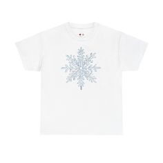 A classic unisex T-Shirt featuring a print of a big ice blue snowflake on the chest. This T-Shirt gives off a cozy winter vibe and is perfect for the holiday season. It is relevant to anyone looking for a casual and comfortable shirt for everyday wear or festive occasions. Product features - Shoulder tape for added stability and prevent stretching - Made from medium fabric of 100% durable cotton - Ribbed knit collar without seam for shape retention - Tear-away label for scratch-free experience - White Graphic Tee For Winter, Snowflake Shirt, Winter Tees, Blue Winter, Blue Snowflakes, Ice Blue, Heavy Cotton, Halloween Shopping, Cotton Shirt