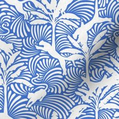 a blue and white wallpaper with an intricate design on the back side of it