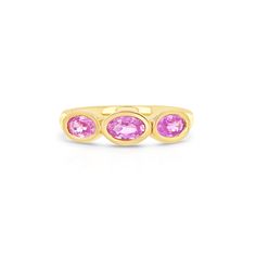 Design Set in handmade bezel, this ring beautifully features three connecting oval pink sapphires on a comfort fit band. Details & Dimensions - 0.90 Carats Pink Sapphire Three-stone Jewelry, Pink Three-stone Sapphire Jewelry, Pink Sapphire Three Stone Jewelry, Pink Oval Three Stone Jewelry, Pink Oval Three-stone Jewelry, Pink Oval Ring With Bezel Setting, Oval Pink Ring With Bezel Setting, Pink Oval Sapphire Ring With Bezel Setting, Graduation Ring