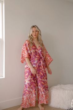 pink and purple boho paisley jumpsuit Bohemian Printed V-neck Jumpsuits And Rompers, Casual Paisley Print Jumpsuits And Rompers For Spring, Casual Spring Jumpsuits And Rompers With Paisley Print, Hippie Style Jumpsuits And Rompers For Vacation, Bohemian V-neck Jumpsuits And Rompers For Brunch, Printed Long Sleeve Jumpsuit And Romper For Vacation, Printed Long Sleeve Jumpsuits And Rompers For Vacation, Bohemian Printed Jumpsuits And Rompers With V-neck, Flowy Jumpsuits And Rompers For Brunch