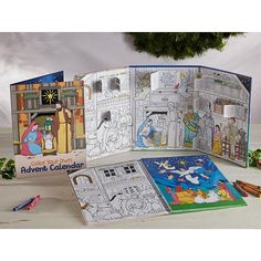 the children's coloring book is open to reveal its contents and features an image of cartoon characters