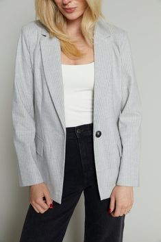 Channel a touch of classic charm with our pinstripe blazer, featuring a smart collared design and a fully lined interior for a polished look. The button front and flap pockets add functional details, making this blazer a timeless piece for both office and weekend wear.Pinstripe: 66% Polyester, 32% Rayon, 2% Spandex Lining: 100% Polyester This style is fitting true to size. Maddison is wearing an XS. XS fits sizes 0 - 2. S fits sizes 4 - 6. M fits sizes 6 - 8. L fits size 10 - 12. Please note all Pinstripe Blazer, Collar Designs, Weekend Wear, Polished Look, Sea Salt, Flap Pocket, Timeless Pieces, Sunglasses Accessories, Dresses For Sale