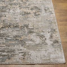 an area rug with various colors and patterns