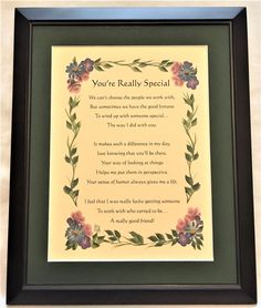 a framed poem with flowers and leaves on the bottom, as you retrie