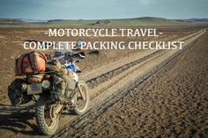 a motorcycle parked on the side of a dirt road in the middle of nowhere with text overlay reading motorcycle travel complete packing checklist