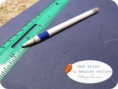 a pencil and ruler sitting on top of a blue surface with the words use ruler to measure out lines