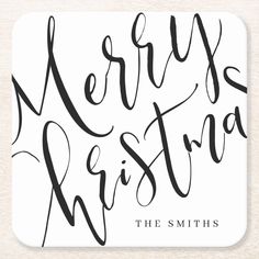 merry christmas the smiths coaster with handwritten lettering on it, in black and white