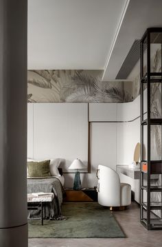 a bedroom with white furniture and palm leaves on the wall behind it, along with a green area rug