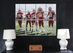 two lamps are next to a photograph of football players