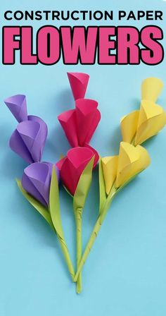 paper flowers with the text construction paper flowers easy craft for kids