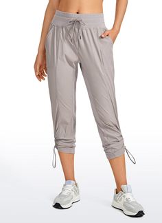 Easy comfort in these pinstripe pants. The fabric is Lovely soft and breathable, move and fit perfectly. Bringing you zero-burden and airy feel during your workout time. Wick your sweat quickly and brings you breezy feel. Feature & Fitting: 
 Designed for hiking or travel 
 Mid waist, 25 inches, slim  fit 
 Drawstring closure 
 Elastic ribbed waistband 
 Two side pockets,c inches Leg 
 Fabric: 
 Pinstripe pattern 
 Sturdy and structured 
 Lightweight and breathable 
 93 Polyamide, 7% Elastan Spring Gym Pants With Drawstring, Sporty Loose Fit Joggers For Yoga, Sporty Yoga Joggers With Loosely Fitted Hips, Solid Color Long Pants Activewear With Drawstring, Gray Drawstring Workout Bottoms, Gray Relaxed Fit Pants For Workout, Solid Color Activewear With Drawstring Long Pants, Gray Relaxed Fit Workout Pants, Gray Drawstring Sports Pants