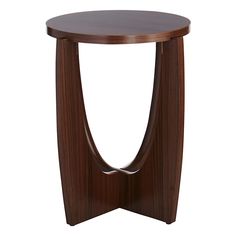 a round wooden table with curved legs