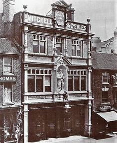 an old black and white photo of a building