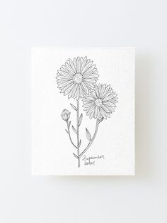 a black and white drawing of two flowers