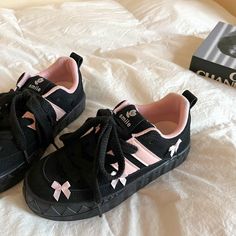 These Blokette Aesthetic Black and Pink Platform Sneakers feature a vegan leather upper with pink stripes, a low ankle rise, lace-up front, and cute pink bows all over. ✨Material: Vegan LeatherRun small, please review the sizing information Trendy Pink Lace-up Skate Shoes, Pink Skate Shoes With Vulcanized Sole For Spring, Pink Harajuku Sneakers With Round Toe, Pink Harajuku Sneakers For Spring, Pink Round Toe Skate Shoes With Laces, Casual Pink Lace-up Skate Shoes, Pink Skate Shoes With Laces For Spring, Pink Skate Shoes For Spring, Trendy Pink Skate Shoes With Laces