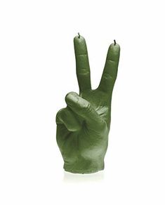 a green peace sign is shown in front of a white background