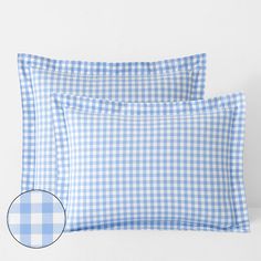 two blue and white gingham pillow cases