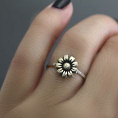 Mammoth Sunflower Ring, Flower Ring, Stack Ring, Silver Stack Ring, Sunflower Stack Ring, Boho Ring, Sterling Silver, Antiqued, Stack Ring This adorable brass and sterling silver sunflower stack ring is one to love! Perfect to wear everyday and if added to other stack rings you can come up with your own unique style too! This is a CUSTOM ORDER There is a processing time for this order. For updates on production times for custom orders please see my shop announcement. Production times vary depend Sunflower Design Rings As Gifts, Adjustable Nickel-free Flower-shaped Rings, Sunflower Design Rings Suitable For Gifts, Flower Shaped Stackable Rings For Gift, Bohemian Flower Ring As A Gift, Nickel-free Flower Ring For Anniversary, Adjustable Nickel Free Flower Ring, Bohemian Flower Ring For Promise, Bohemian Flower Rings For Anniversary