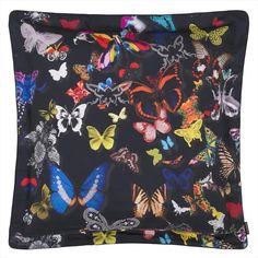 a black square pillow with colorful butterflies on the front and back side, all in different colors