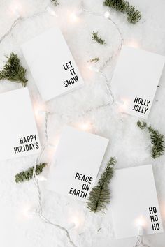 christmas cards with the words let it snow, happy holidays and peace on earth written on them