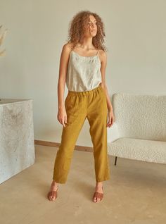 "PRODUCED in 3-5 days FAST & FREE shipping with DHL Express Courier -10% for all items with code \"FAVOURITE\" Playful actions create a happy routine! Handcrafted from pure breathable linen, these straight cut trousers with an elastic waistband are ideal for everyday adventures. Details: - 100% Linen - Pure linen fabric - Elastic waistband - Straight cut - Ankle length - Model's height is 180 cm / 5'11'' wears size M - Code: E3002-L532-266 The trousers are available in other colors. You can find them in the gallery. If you want to order the trousers in another color, please specify it in the personalization field. Sizing: This garment is true to size, and we recommend choosing the size you usually wear. If you want the garment to be loose-fitting, choose a larger size than you usually wear Relaxed Fit Linen Pants For Everyday, Everyday Beige Linen Pants, Relaxed Linen Pants With Straight Hem, Everyday Linen Long Pants, Flax Linen Pants With Elastic Waistband, Relaxed Fit Flax Pants, Everyday Straight Linen Pants, Everyday Straight Leg Linen Pants, Ankle-length Linen Pants For Everyday