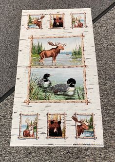 a quilt with animals and birds on it