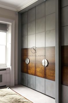 an image of a bedroom with mirrored closet doors