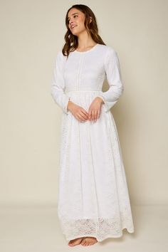 Beautiful lace white maxi dress with long sleeves, keyhole back closure, elastic back band and side pockets. Dress is lined but is still see through. You will need a full slip for modesty. Self-95% nylon, 5% spandex Lining-100% polyester Hand wash in cold. Aprox. measurements in inches: S:Length-55 |Bust-33 |Waist-28 M:Length-55 |Bust-34 |Waist-30 L:Length-55 |Bust-36 |Waist-31 XL:Length-55 |Bust-37 |Waist-32 modest dresses, modest dress, modest midi, modest maxi, modest fashion, modest trendy d Modest White Dress, Lds Temple Dress, Temple Dresses, Floral Crochet Dress, Maxi Dress With Long Sleeves, Nursing Friendly Dress, Modest Maxi Dress, Temple Dress, White Lace Maxi Dress