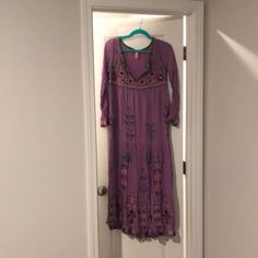 Nwot. Never Worn. Beautiful Light Purple Dress With Tribal Print As Pictured. Tassel Tie In Front. There Is No Tag Indicating The Fabric But I Think There Is Definitely Rayon. Spring Purple Long Maxi Dress, Purple Long Maxi Dress For Spring, Lavender Long Sleeve Maxi Dress For Summer, Purple Bohemian Spring Maxi Dress, Bohemian Purple Spring Maxi Dress, Bohemian Purple Maxi Dress For Spring, Purple Long Sleeve Maxi Dress For Beach, Long Casual Purple Dress, Bohemian Mauve V-neck Dress