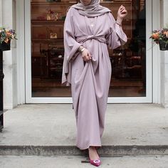 An effortlessly chic look with this Wrap Belt Maxi Dress. It has a unique design with two tie belts at the front which allows you to style the dress as a knot or a wrap belt. Available in 5 beautiful colors. Two Pieces Dress, Kaftan Gown, Islamic Dress, Mode Abaya, Worship Service, Fashion Muslim, Muslim Outfits, Muslim Dress, Modest Wear