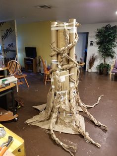 a pile of cardboard sitting on top of a hard wood floor