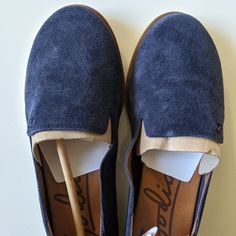 Move Stylishly Wherever The Day Takes You In This Casual And Sporty Loafer. Suede Upper. Slip-On Styling. Round Toe. Extra Arch And Heel Cushioning For Comfort With Every Step. 1/2 Inch Heel. Sawtooth Outsole. 0.5" Heel Slip On Leather Or Suede Upper, Synthetic Lining, Manmade Sole Size: Us 5.5 (Regular) Comes With Shoebox. Everyday Suede Slip-ons With Round Toe, Navy Slip-ons With Rubber Sole And Round Toe, Navy Round Toe Slip-ons With Rubber Sole, Blue Slip-ons With Cushioned Footbed And Round Toe, Blue Cushioned Slip-ons With Round Toe, Navy Leather Slip-ons Casual Style, Casual Blue Suede Slip-ons, Leather Flats Women, Pointy Toe Flats