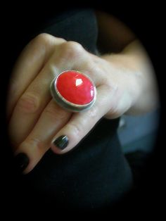 "the \"poppy ring\" is made with a faceted vintage cabochon in a sassy hot red hue. this is my all time favorite ring. it is definitely my go to ring and wear it everyday. get one for yourself.  this ring is all hand fabricated, soldered, sanded, hammered, manipulated, and oxidized out of sterling silver raw materials... by me in my studio in austin, tx. all stones are vintage glass cabochons and may have subtle imperfections such as hairline crazing, pocks, etc. This adds to the character and f Modern Red Cabochon Ring, Modern Red Cabochon Jewelry, Modern Handmade Red Ring, Modern Handmade Red Rings, Poppy Ring, Red Neon, Band Art, Minimalist Women, Red Poppy