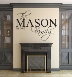 a wall decal that says the mason family with a fireplace in front of it