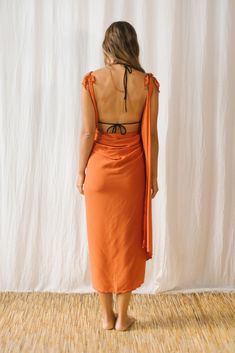 Long sarong, with two cuts at the ends that, by tying them, become sleeves to be used as a dress.

In boiler tone with golden sparkles made of viscose.
Comfortable, fresh and light.
The model is wearing a size S.
Measurements 170/5' 7'' Bust - 85/33½'' Waist - 67/26½'' Hip - 94/37 Summer Wrap Dresses With Draped Sleeves, Wrap Beach Dress With Tie Back, Tie Back Wrap Dress For Party, Silk Wrap Dress For The Beach, Silk Wrap Beach Dress, Beachwear Wrap Dress For Festival, Festival Beachwear Wrap Dress, Silk Beach Dress With Tie Back, Beach Silk Dress With Tie Back