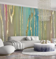 a modern living room with an abstract painting on the wall