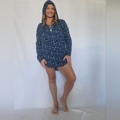 Raisins Blue Floral Swim Cover With Tie Up Front And Hood. 100% Rayon. Blue Hooded Top For Beach, Blue Hooded Tops For Beach, Blue Hooded Beach Tops, Blue Hooded Tops For The Beach, Blue Drawstring Hood Top For Loungewear, Blue Bohemian Tops For Loungewear, Bohemian Blue Top For Loungewear, Bohemian Blue Tops For Loungewear, Swim Cover