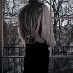 a person standing in front of a window