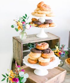 a table topped with donuts and other pastries