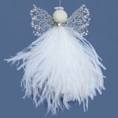 a white feather angel ornament hanging from a string on a blue background with beads