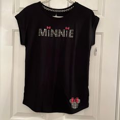 Black T With Minnie And Minnie Mouse Appliqu In Black N White Gingham With Red Bow New With Tag Casual Black Minnie Mouse Top, Black Casual Minnie Mouse Top, Black Minnie Mouse Crew Neck Top, Disney Boutique, Black T-shirt With Minnie Mouse Graphic, Crew Neck, Spring Minnie Mouse Cotton T-shirt, Black Minnie Mouse Short Sleeve T-shirt, Halloween Scrubs, Black Minnie Mouse T-shirt Short Sleeve