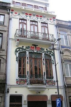 an old building with many windows and balconies