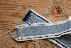 "This is a new item I have added to DavidsonStudio.    My denim craze continues.. I have denim garment remnants that I just can't throw away.. I must continue to create.    I have plans for several belts in various sizes and color combinations.  Each belt is unique and one of a kind!  Enjoy!! This belt is made using strips of light and dark wash denim that has been frayed on the edges and stitched together.  This is a D-Ring belt that is adjustable to fit most sizes.   It is 1.5\" wide (4 cm) an Denim Belts Diy, Blue Recycled Denim Pants With Belt Loops, Streetwear Recycled Denim Jeans With Belt Loops, Denim Obi Belt, Denim Corset Belt, Rustic Belt, D Ring Belt, Denim Belt, Tie Dye Outfits