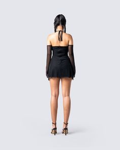 Pretty, and tempting ❤️ Do all the things you shouldn't in this black mini dress with halter straps, off-shoulder sleeves, and complete with a mesh overlay and bow detailing ✨ Black Fitted Mini Halter Dress, Coquette Mini Dress For Summer Evenings, Chic Sheer Off-shoulder Mini Dress, Coquette Spaghetti Strap Mini Dress For Date Night, Flirty Mini Dress With Sheer Sleeves, Black Halter Neck Mini Dress For Club, Black Mini Mesh Dress For Party, Coquette Mini Length Corset Dress For Night Out, Stretch Mesh Mini Dress For Party