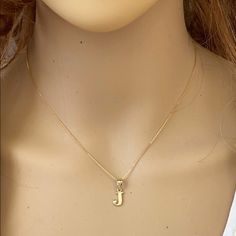 Solid 14k Gold Small Mini Initial Letter J Pendant Necklace Metal Type: 14k Solid Yellow Gold (Also Available In 10k Solid Gold) Metal Color: Yellow Gold. (Also Available In White Gold And Rose Gold) Pendant W/Chain Weight: 1.4 - 1.6 Grams (Vary From Chain) Height Including Bail: 0.60 In (15.79 Mm) Width: 4.80 Mm - 11.32 Mm Chain Available In 16", 18", 20", 22" Letter E Is For Size Demonstration Only. Available In Another Listings In Any Letter A-Z J Chain Necklace, J Letter Pendant, 14k Yellow Gold Initial Necklace Stamped 14k, 14k Yellow Gold Initial Necklace, Yellow Gold 14k Initial Necklace, Yellow Gold Initial Necklace, J Initial Necklace, Cross Necklace Sideways, Shine Jewelry