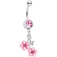 a pink belly ring with flowers and pearls hanging from it's side, on a white background